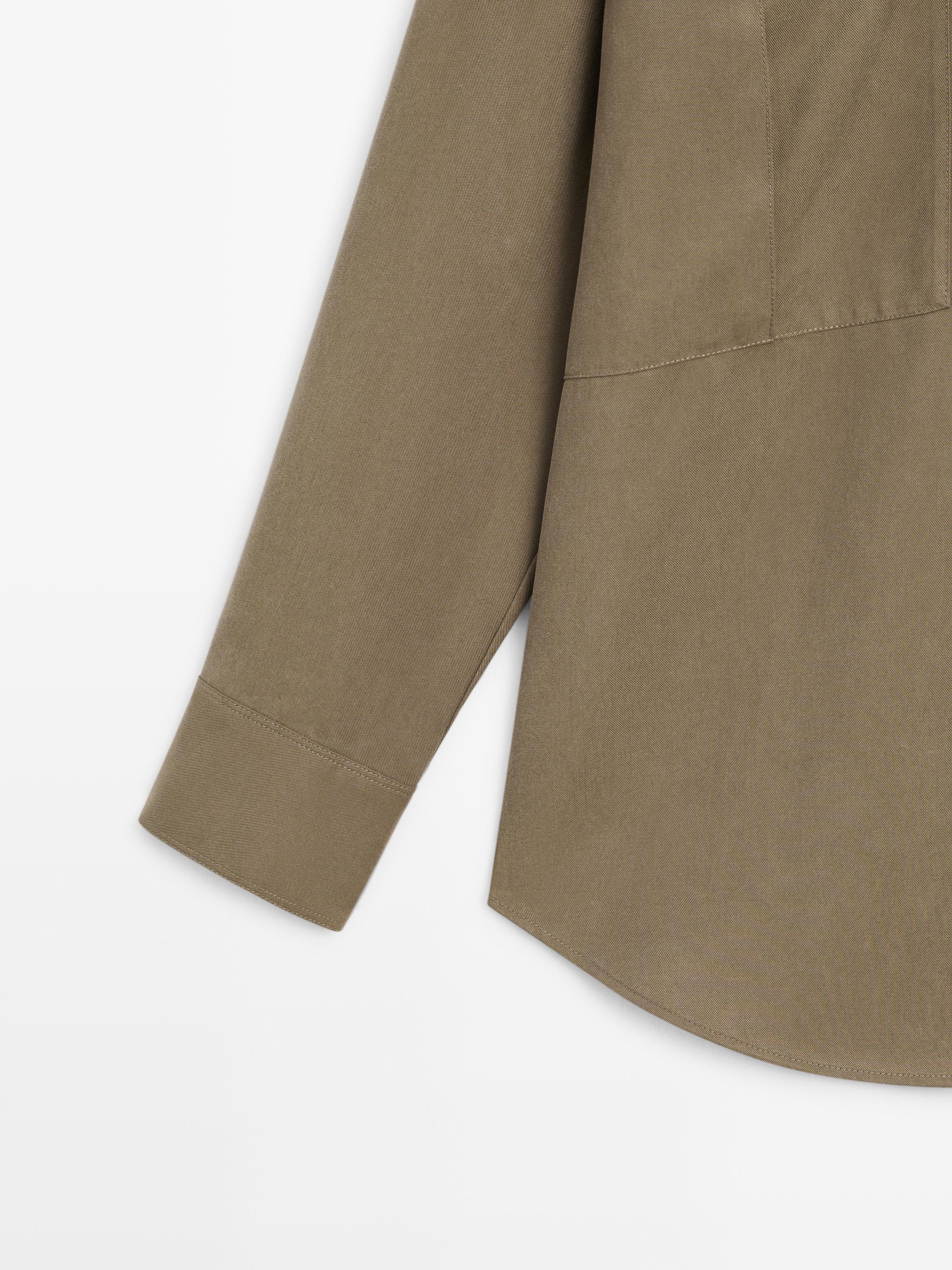 Long shirt with pocket details